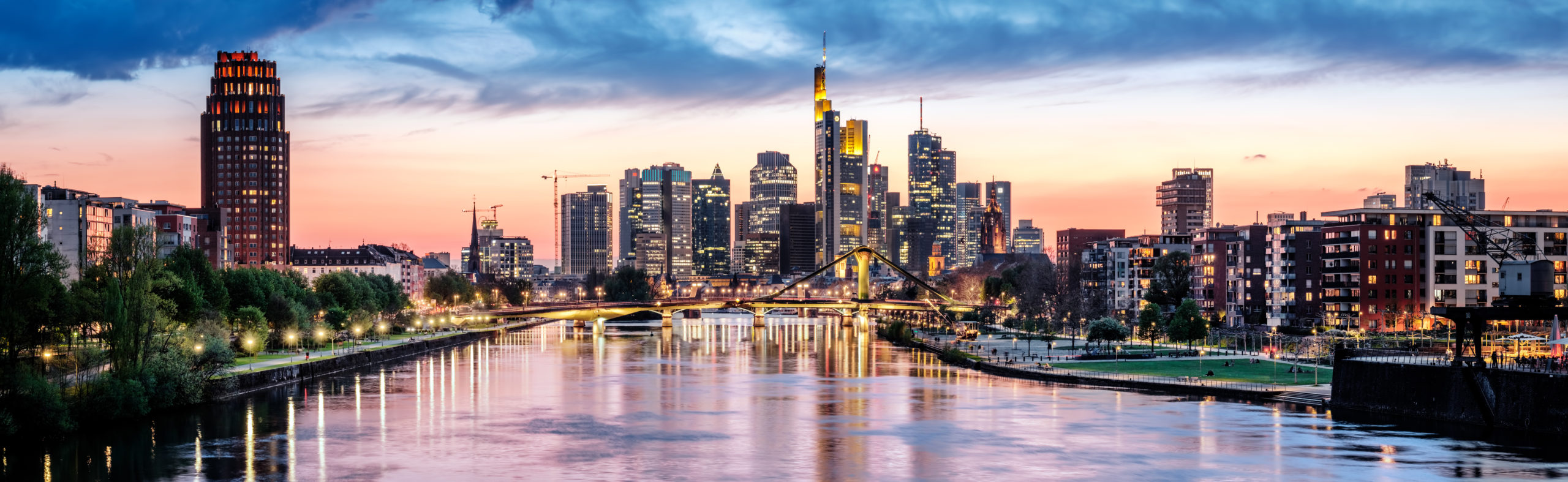 High resolution aerial panoramic view of Frankfurt, Germany after sunset.